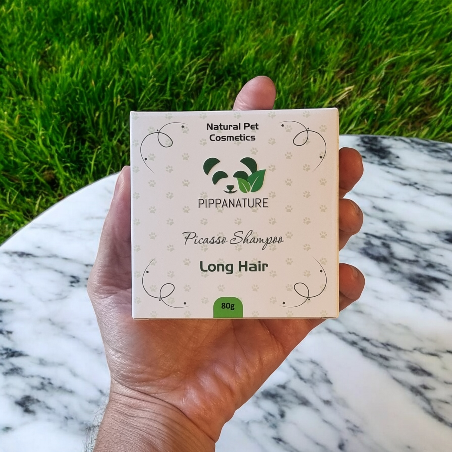 Picasso solid shampoo bar displayed in a natural setting, highlighting its eco-friendly and nourishing formula for long-haired dogs.